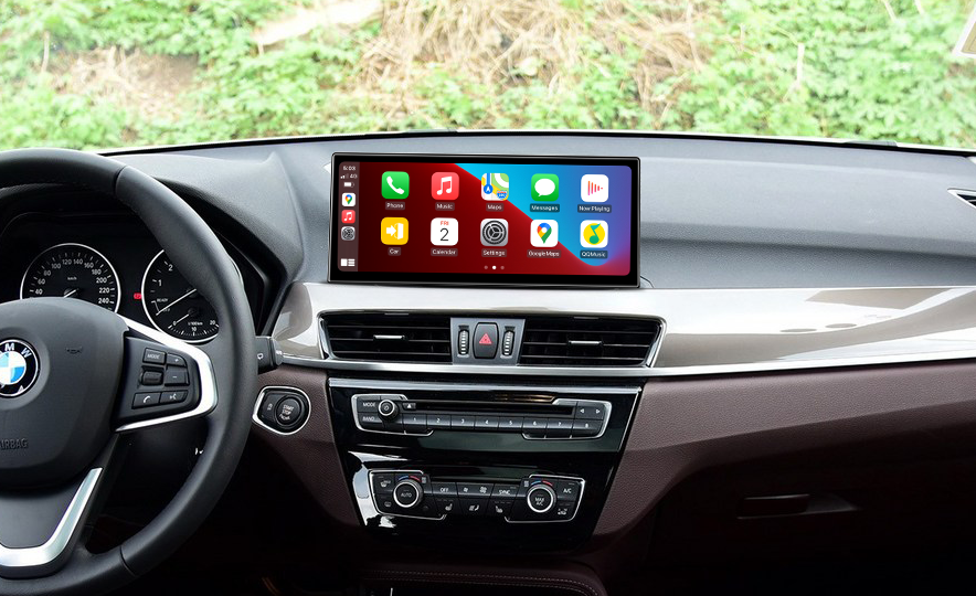 BMW X1 dashboard with aftermarket CarPlay touchscreen display