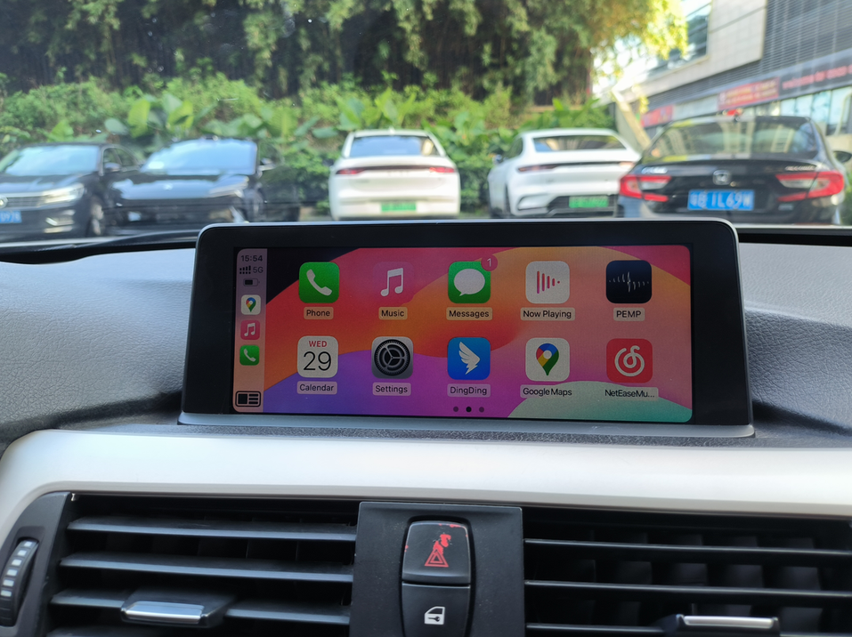 BMW all-in-one CarPlay screen interface with app icons