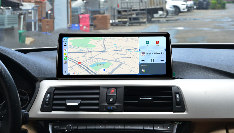 BMW split-screen showing navigation map and music controls