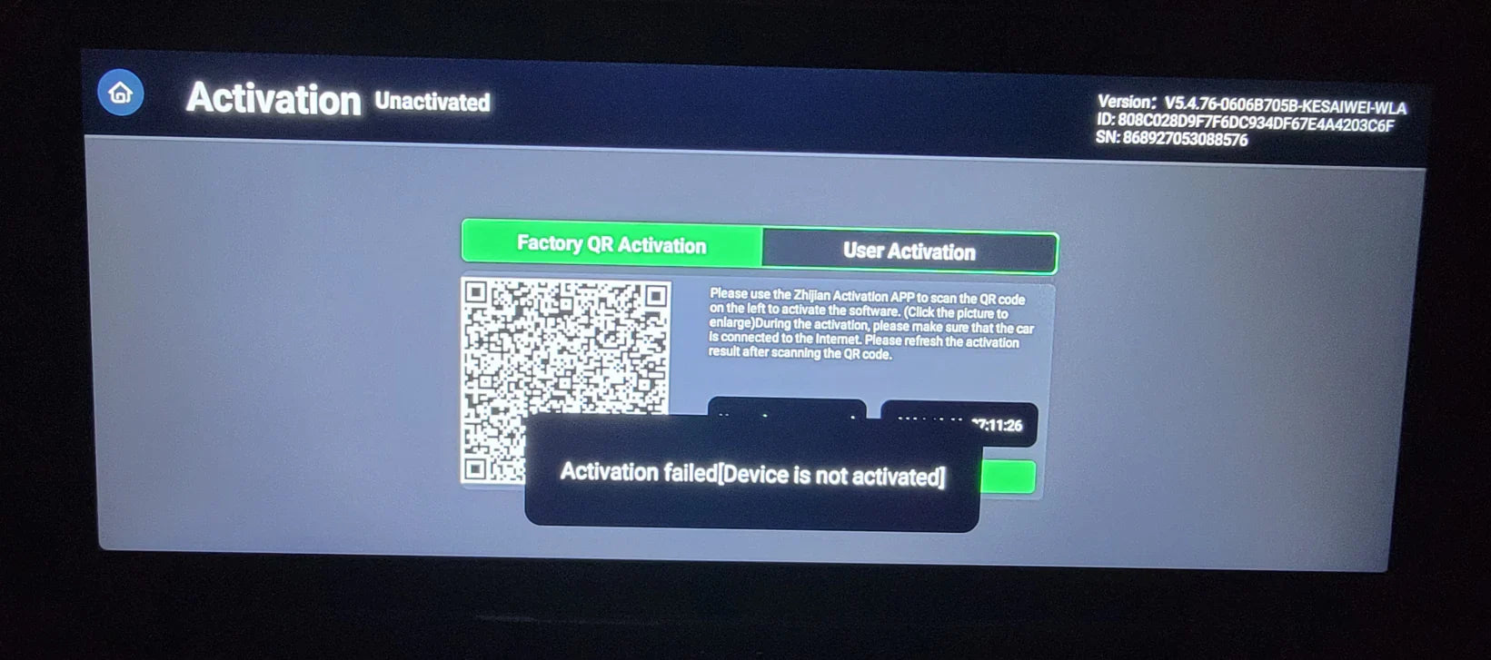 Car infotainment screen displaying an "Activation Failed [Device is not activated]" message with QR codes for activation.